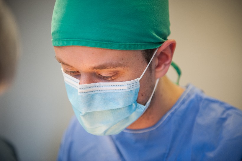 vet wearing surgery mask