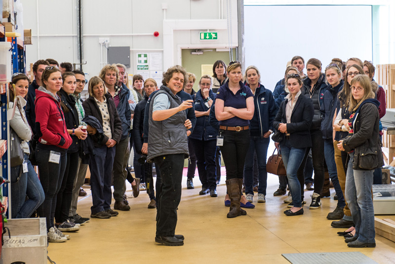 Renate Weller talking to a group of people